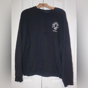 black crew neck, lightly worn, with kevin haring design on front and back.